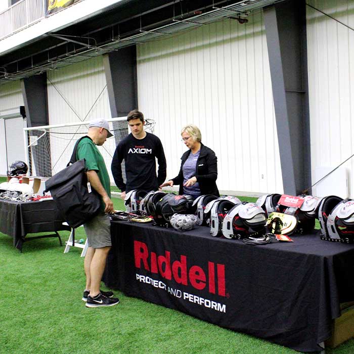 Football gear set up at a tradeshow boot at the AHN Montour Sports Complex in Coraopalis PA.